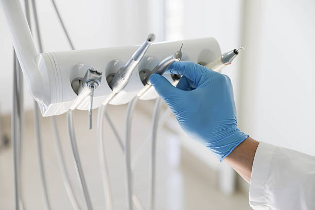 Professional Emergency Dentist technician working in Forsyth, IL